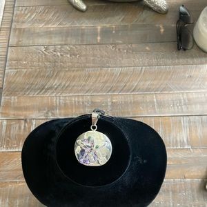 Silver sand dollar necklace pendant